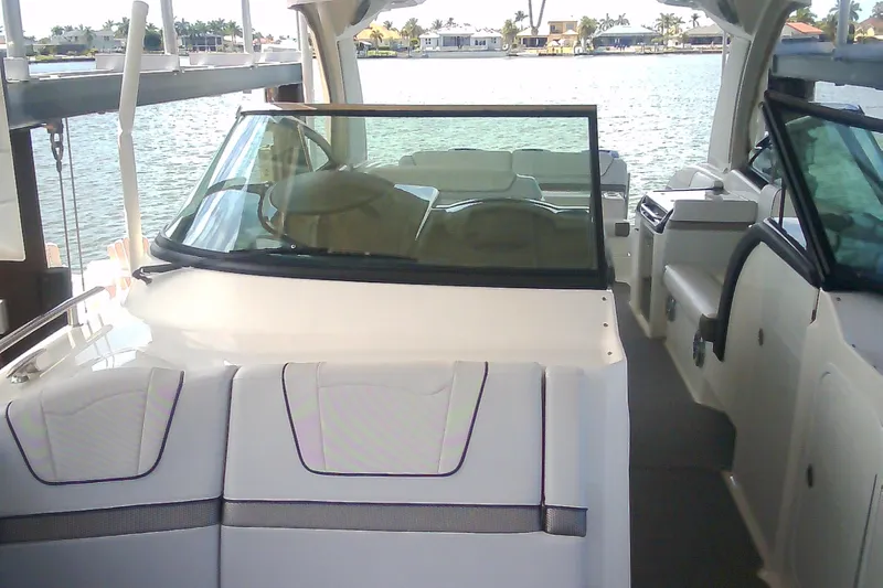 Slide: The Image of 2020 Formula 350 Crossover Bowrider interior with waterfront view. - 71