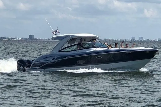 Slide: The Image of 2020 Formula 350 Crossover Bowrider cruising on open water with passengers onboard. - 76