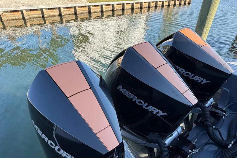 Slide: The Image of 2022 Cruisers Yachts 38 GLS OB with triple Mercury outboard engines on water. - 8