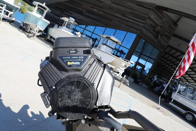 Slide: The Image of Outdoor display of a 2021 Gator Trax 1654 boat with HDR 5000 EFI engine. - 8