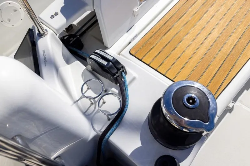 Slide: The Image of Cockpit detail of 2018 Jeanneau Sun Odyssey 440 sailboat with winch and teak decking. - 19