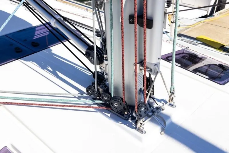 Slide: The Image of Jeanneau Sun Odyssey 440 sailboat rigging detail, 2018 model, showcasing ropes and pulleys. - 5
