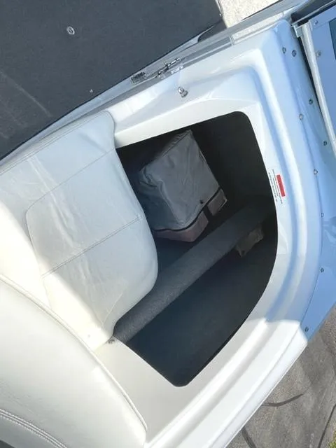 Slide: The Image of Covered marina dock with seating, grill, and 2011 Cobalt 242 WSS boat. - 27