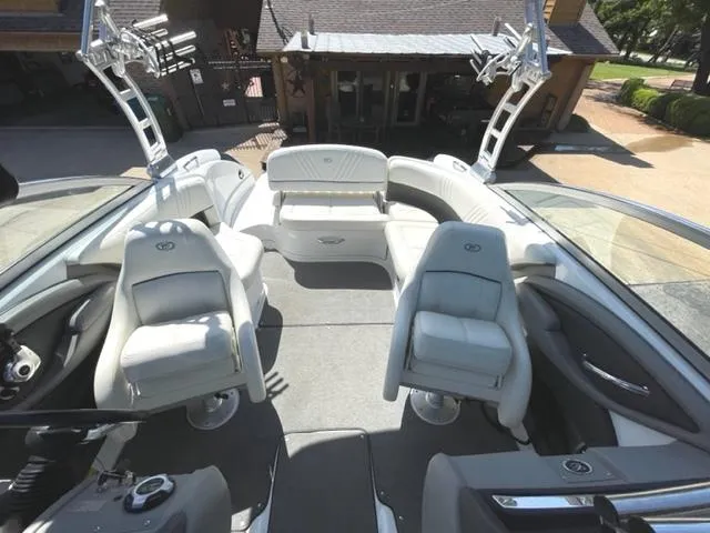 Slide: The Image of Propeller of 2011 Cobalt 242 WSS boat submerged in water near dock. - 29