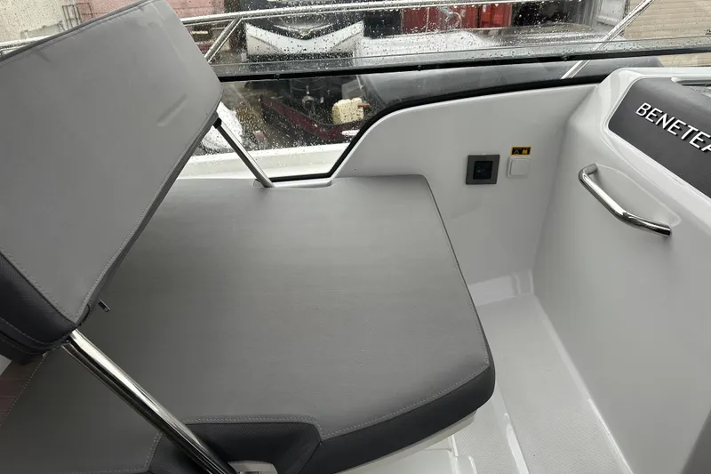 Slide: The Image of Interior seating of 2023 Beneteau Antares 9 boat, featuring sleek design and modern upholstery. - 17