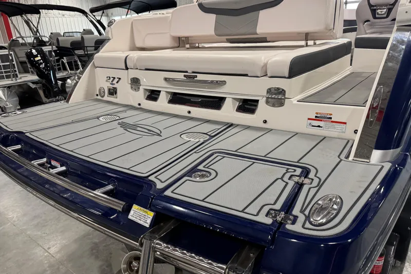 Slide: The Image of 2020 Chaparral 287 SSX boat with spacious swim platform and seating area. - 14