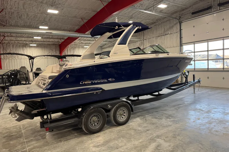 Slide: The Image of 2020 Chaparral 287 SSX boat on trailer in indoor showroom. - 4