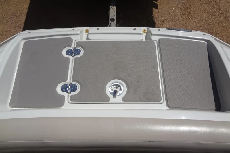 Slide: The Image of 2013 Crownline Eclipse E4 boat swim platform with gray non-slip surface. - 14