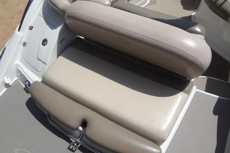 Slide: The Image of 2013 Crownline Eclipse E4 boat seating area with beige upholstery. - 19