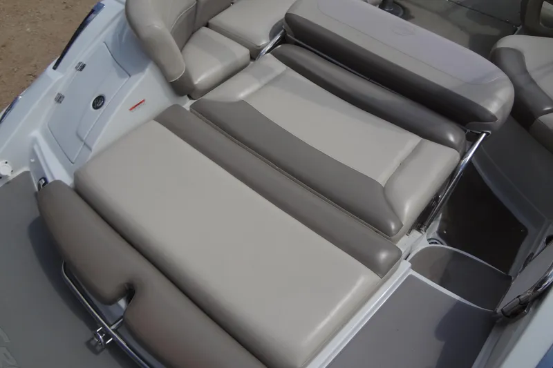 Slide: The Image of 2013 Crownline Eclipse E4 boat interior with gray and beige seating arrangement. - 21
