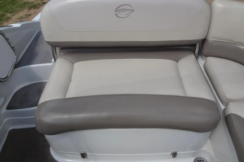 Slide: The Image of 2013 Crownline Eclipse E4 boat seat with gray and white upholstery. - 23