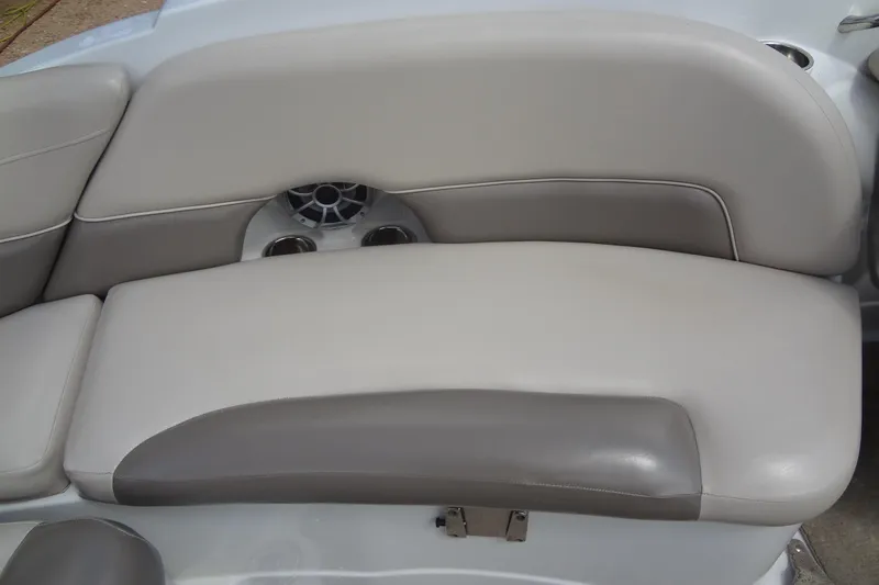 Slide: The Image of 2013 Crownline Eclipse E4 boat seat with cup holders and speaker. - 25