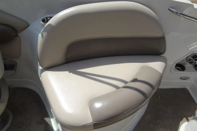 Slide: The Image of 2013 Crownline Eclipse E4 boat seat with beige and gray upholstery. - 27
