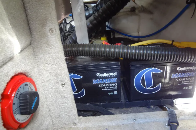 Slide: The Image of Marine batteries and switch in a 2013 Crownline Eclipse E4 boat. - 40