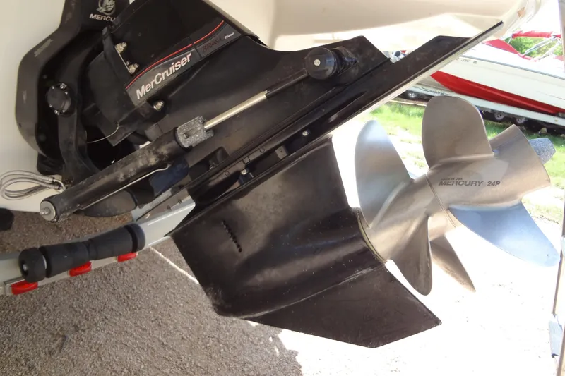 Slide: The Image of 2013 Crownline Eclipse E4 boat with MerCruiser Bravo Three outdrive and Mercury 24P propeller. - 42