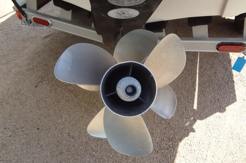 Slide: The Image of 2013 Crownline Eclipse E4 boat with MerCruiser Bravo Three outdrive and dual propellers. - 44