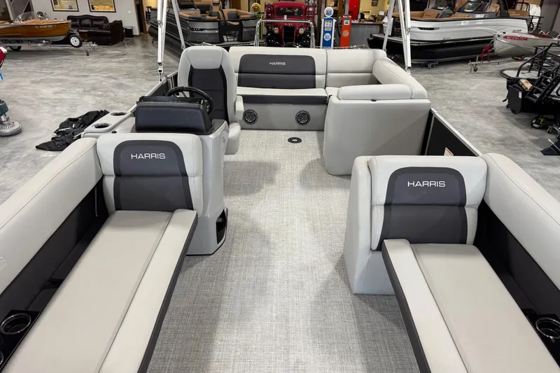 Slide: The Image of 2024 Harris Cruiser 230 pontoon boat interior with spacious seating and modern design. - 7