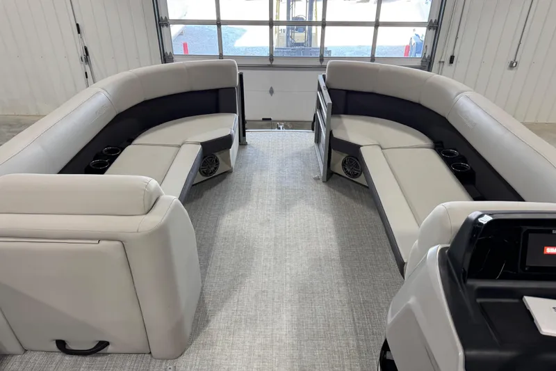 Slide: The Image of 2024 Harris Cruiser 230 interior with plush seating and modern design. - 8