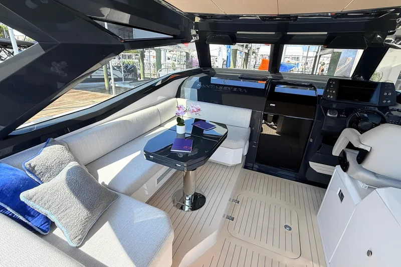 Slide: The Image of Luxurious interior of 2026 Santasevera 42 yacht with elegant seating and modern controls. - 1