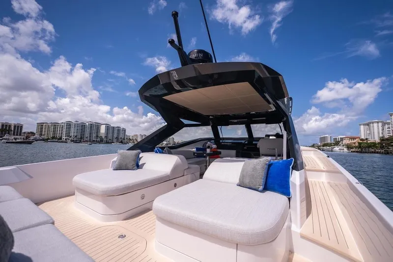 Slide: The Image of Luxurious 2026 Santasevera 42 yacht with plush seating, cruising on a sunny day. - 13