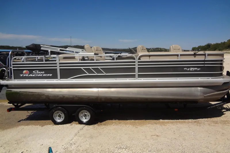 Slide: The Image of 2022 TRACKER MARINE Party Barge 24 DLX pontoon boat on trailer, side view. - 14