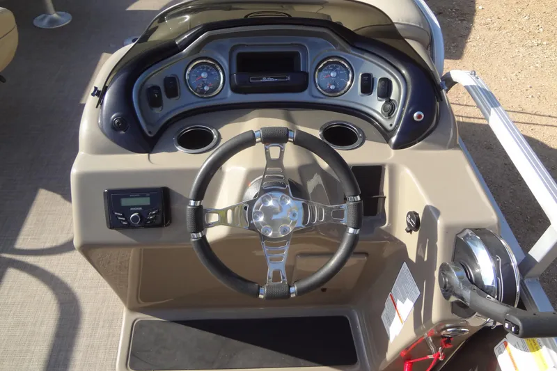 Slide: The Image of Steering console of 2022 TRACKER MARINE Party Barge 24 DLX pontoon boat. - 31