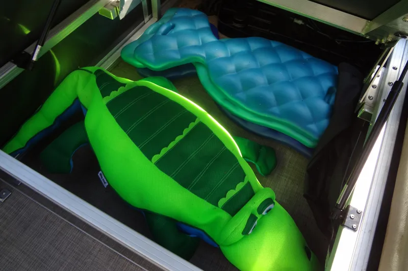 Slide: The Image of Storage compartment of 2022 TRACKER MARINE Party Barge 24 DLX with inflatable floats. - 41