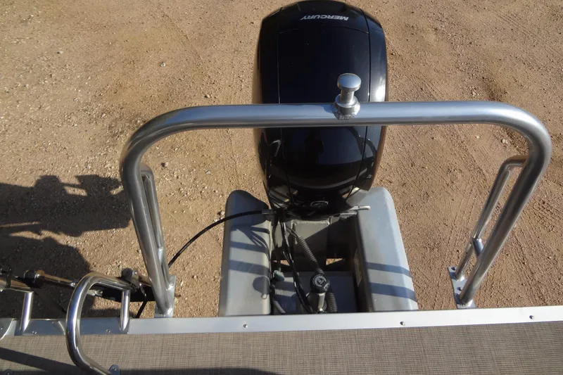 Slide: The Image of 2022 TRACKER MARINE Party Barge 24 DLX with Mercury outboard motor, rear view. - 42