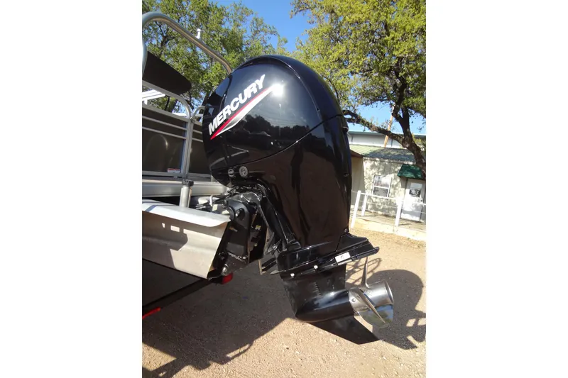 Slide: The Image of Mercury outboard motor on 2022 TRACKER MARINE Party Barge 24 DLX, parked outdoors. - 45