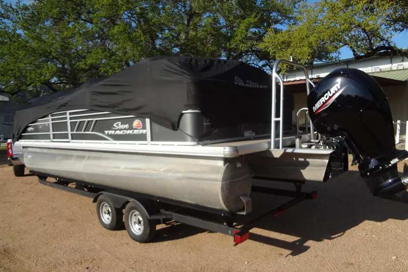 Slide: The Image of 2022 TRACKER MARINE Party Barge 24 DLX pontoon boat with Mercury engine on trailer. - 49