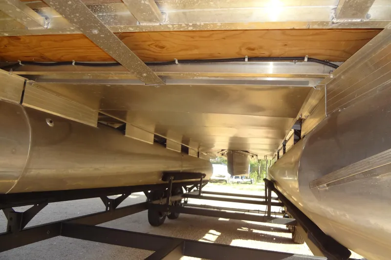 Slide: The Image of Underneath view of 2022 TRACKER MARINE Party Barge 24 DLX pontoon boat. - 51