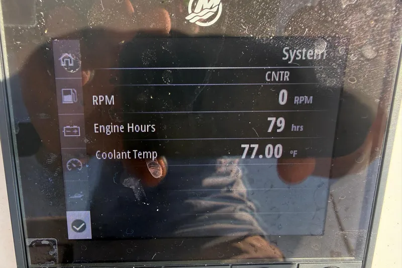 Slide: The Image of Display screen of 2022 Tidewater 2410 Bay Max showing RPM, engine hours, and coolant temperature. - 12