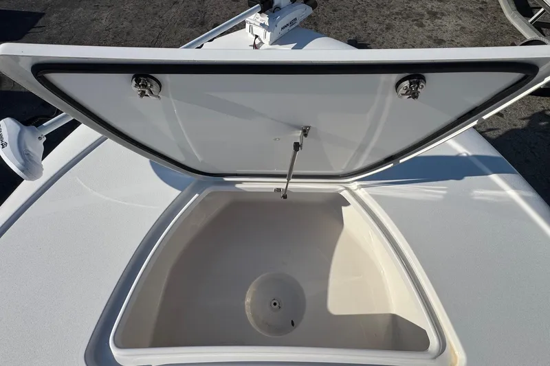 Slide: The Image of Open storage compartment on 2022 Tidewater 2410 Bay Max boat deck. - 23