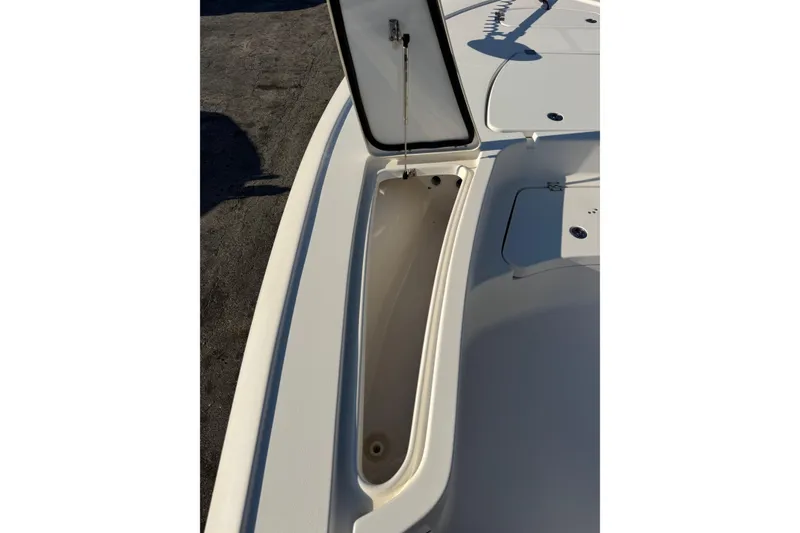 Slide: The Image of Open storage compartment on 2022 Tidewater 2410 Bay Max boat deck. - 26