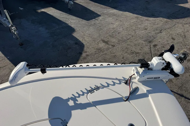 Slide: The Image of 2022 Tidewater 2410 Bay Max boat with Minn Kota trolling motor on deck. - 28