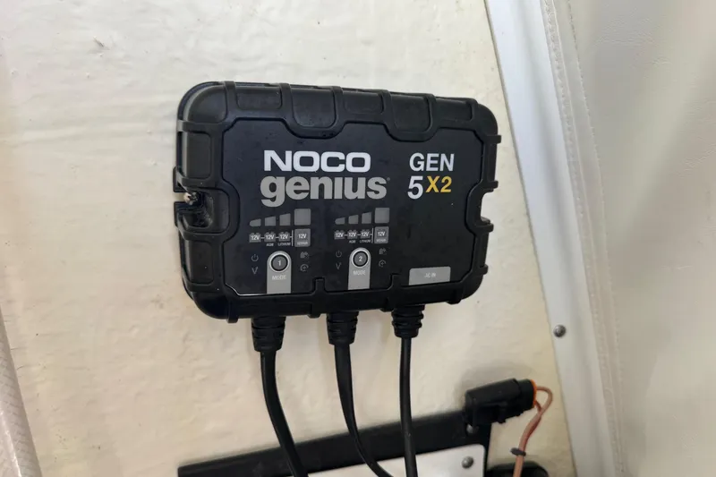 Slide: The Image of NOCO Genius GEN 5X2 battery charger installed on 2022 Tidewater 2410 Bay Max boat. - 35