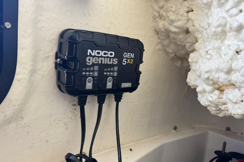 Slide: The Image of NOCO Genius GEN 5X2 charger installed on 2022 Tidewater 2410 Bay Max boat. - 37