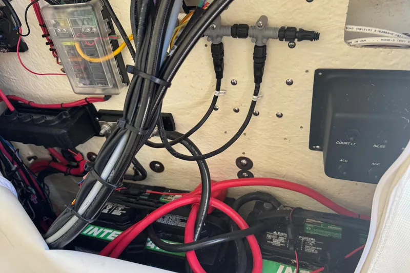 Slide: The Image of 2022 Tidewater 2410 Bay Max boat wiring and battery setup, showcasing electrical components. - 39