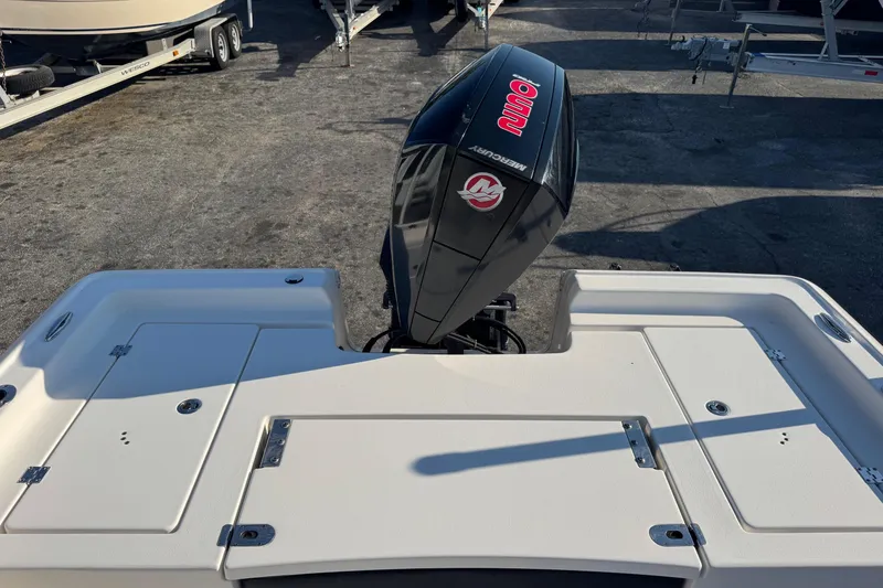 Slide: The Image of 2022 Tidewater 2410 Bay Max boat with Mercury outboard motor, viewed from the rear. - 43