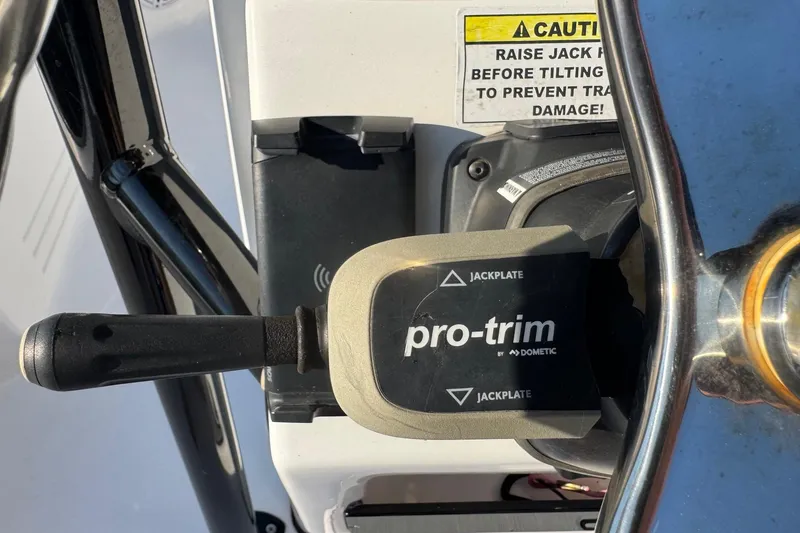 Slide: The Image of Pro-trim control on 2022 Tidewater 2410 Bay Max boat, featuring jackplate adjustment. - 50