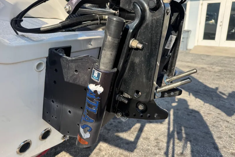 Slide: The Image of Close-up of 2022 Tidewater 2410 Bay Max boat's hydraulic jack plate mechanism. - 52