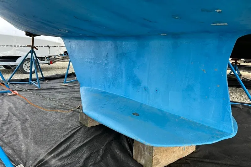 Slide: The Image of Blue keel of a 1998 Catalina 36 MkII sailboat on stands. - 21