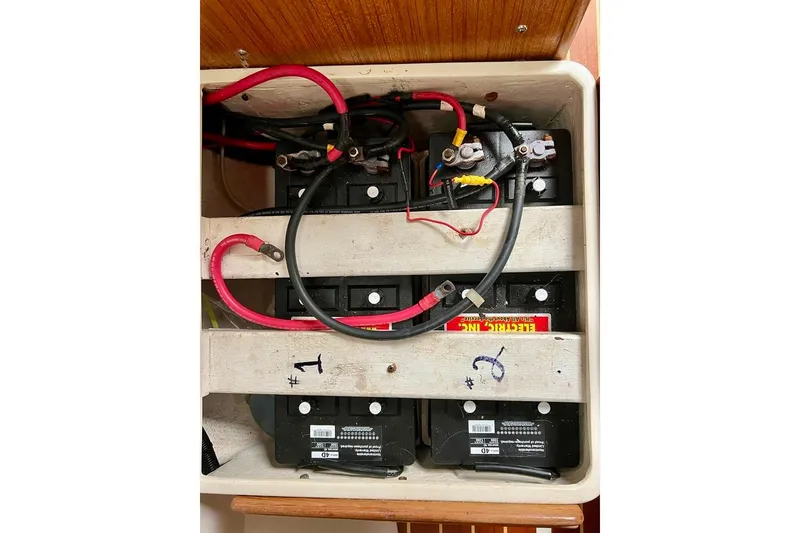 Slide: The Image of Battery compartment of a 1998 Catalina 36 MkII sailboat with wiring connections. - 24