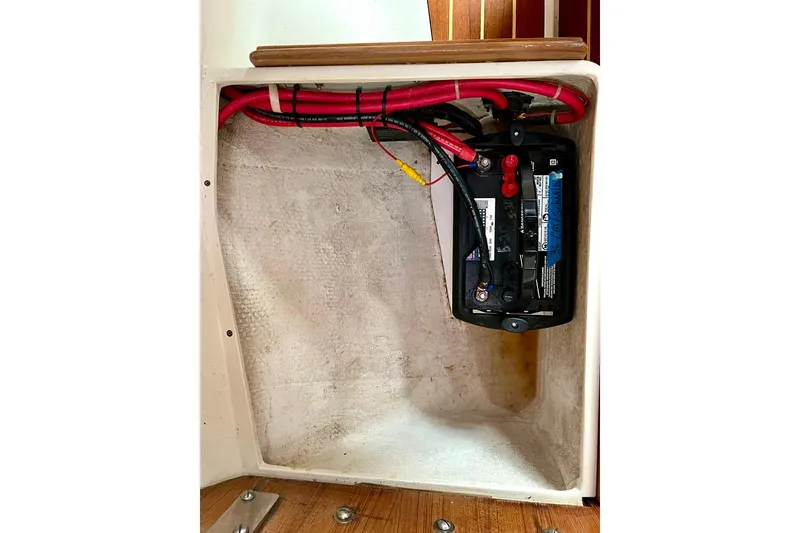 Slide: The Image of Battery compartment of a 1998 Catalina 36 MkII sailboat with wiring. - 25