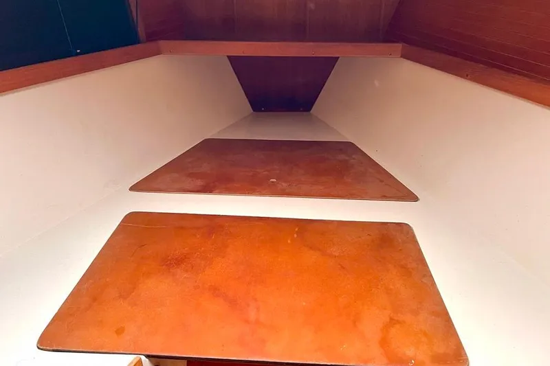 Slide: The Image of Interior view of 1998 Catalina 36 MkII sailboat cabin with wooden surfaces. - 27