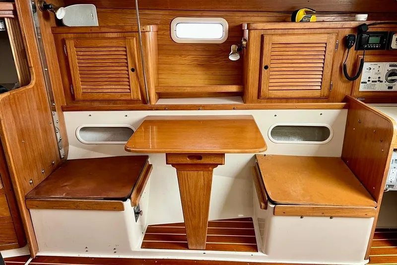 Slide: The Image of Interior of a 1998 Catalina 36 MkII sailboat with wooden cabinetry and seating. - 29