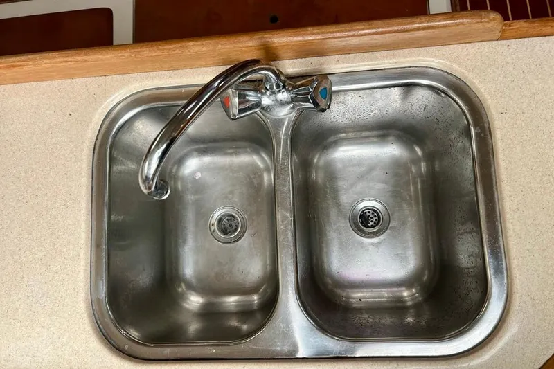 Slide: The Image of Stainless steel double sink with faucet on Catalina 36 MkII, 1998 model. - 36