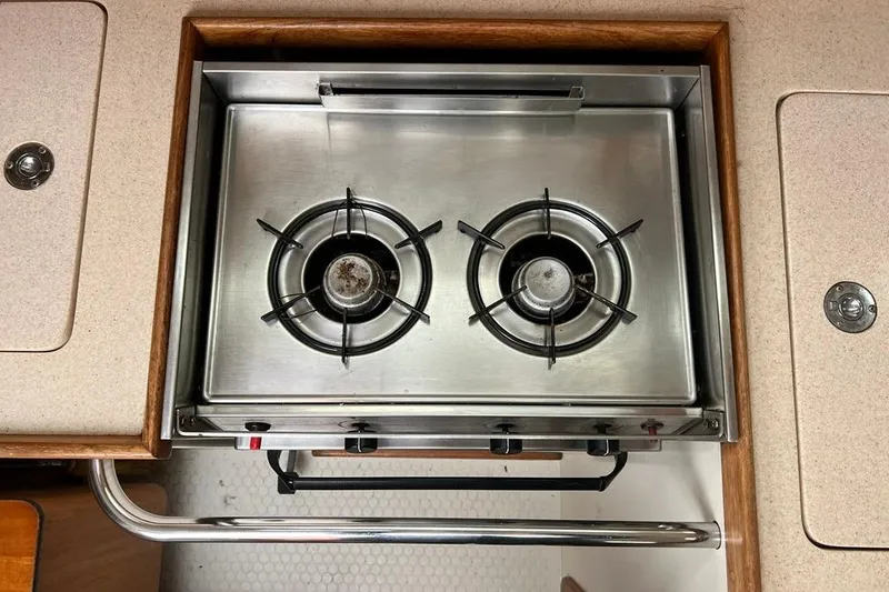 Slide: The Image of Stainless steel two-burner stove in 1998 Catalina 36 MkII yacht kitchen. - 46