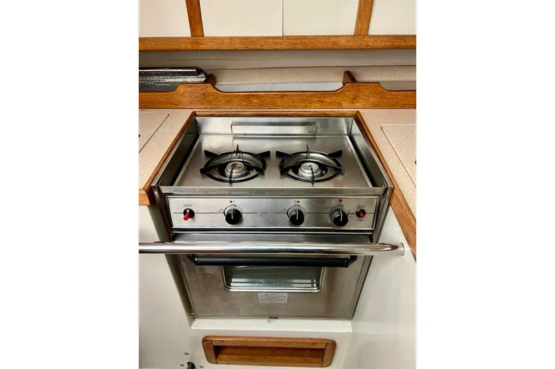 Slide: The Image of Stainless steel stove and oven in 1998 Catalina 36 MkII yacht kitchen. - 47