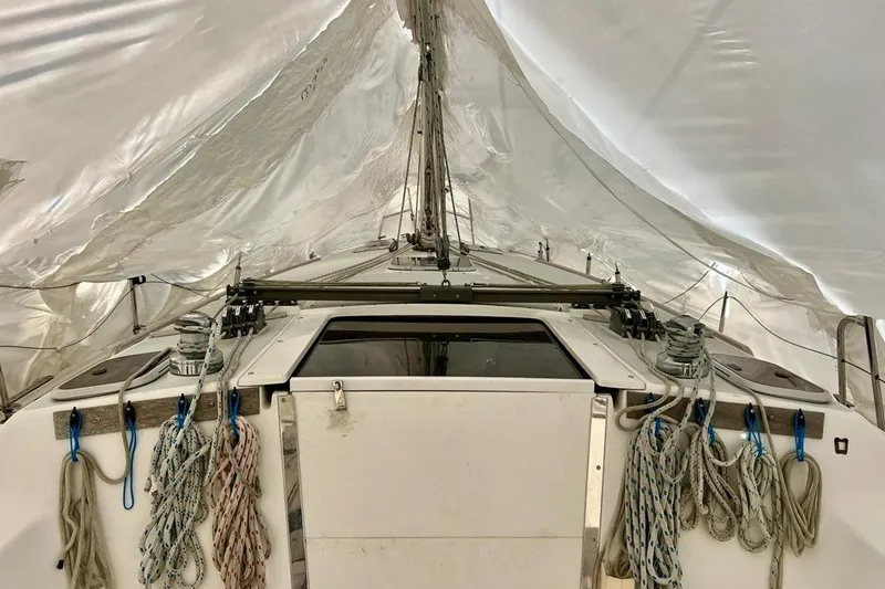 Slide: The Image of 1998 Catalina 36 MkII sailboat cockpit with ropes and covered deck. - 5
